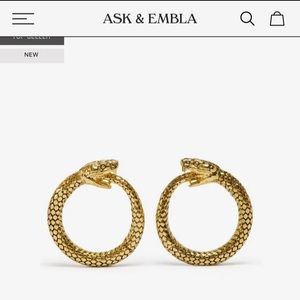 Ask & Embla Brand gold gauge hoop earrings.
